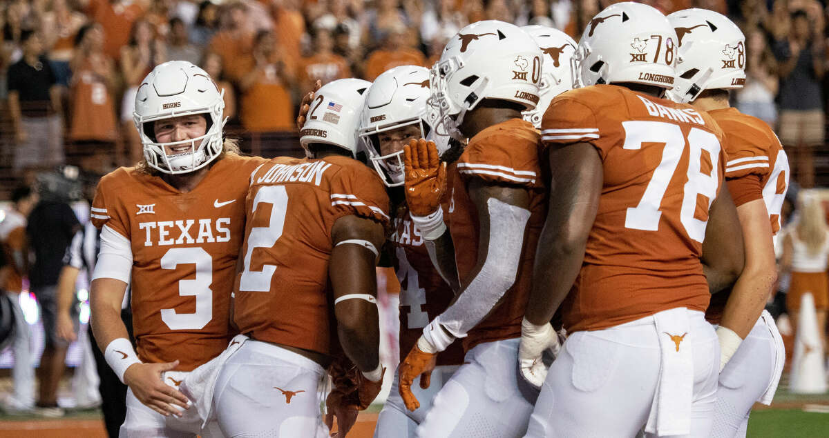 Redshirt freshman starter Quinn Ewers, far left, and the Longhorns are looking to finish 2022 on a high note in Thursday's Alamo Bowl. 