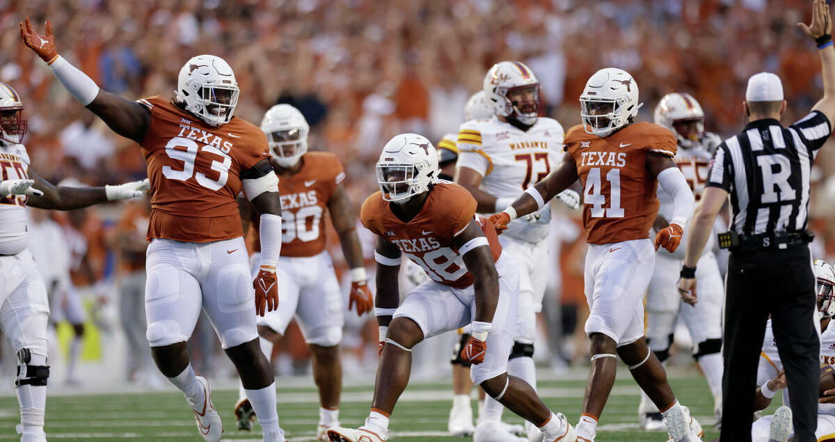 Texas sophomore Barryn Sorrell (88) celebrates with teammates after a sack against the Louisiana Monroe on Sept. 3. He faces a tougher test against Alabama this week.