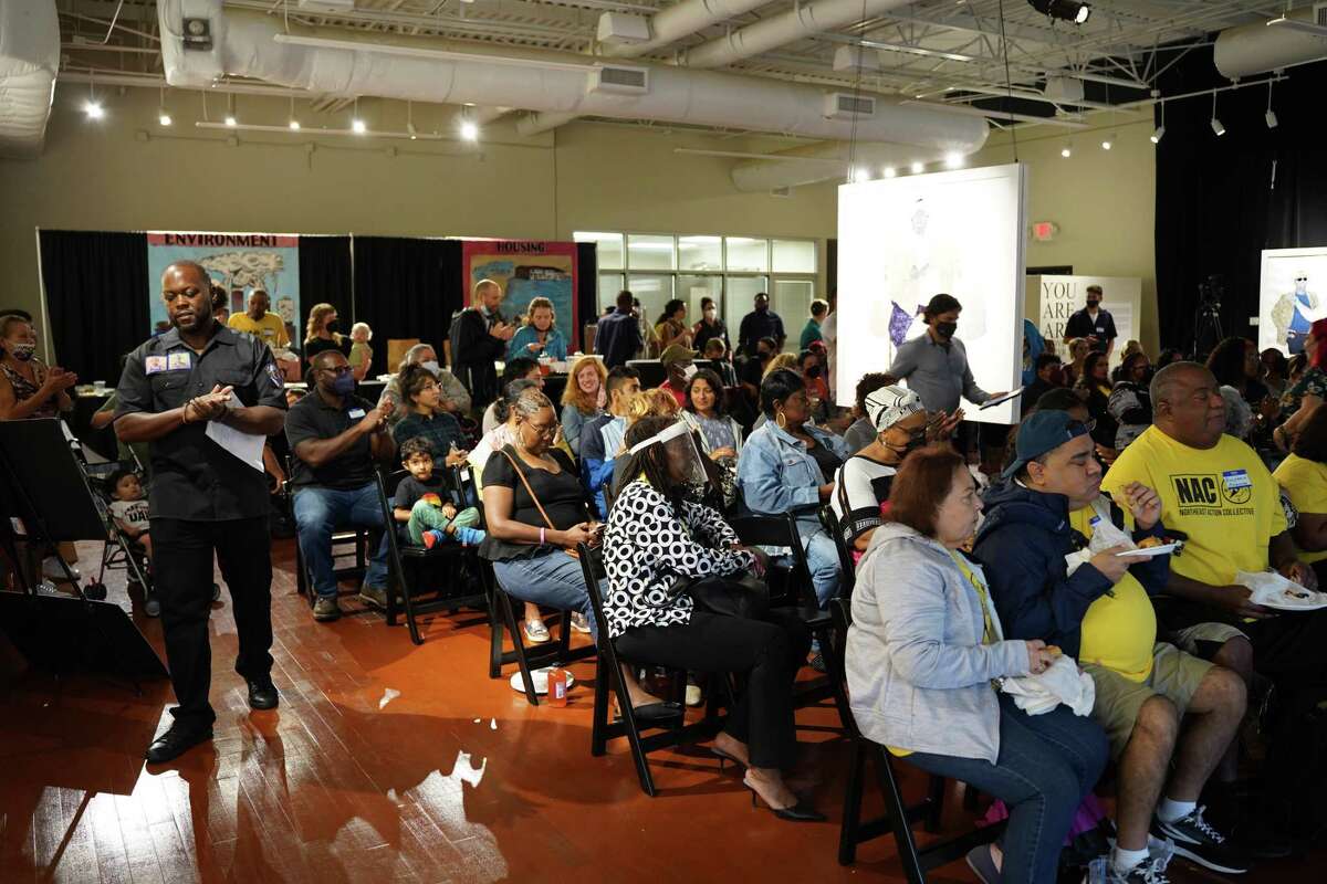 Community members from flood-affected areas fill the DeLuxe Theater reception hall for West Street Recovery’s Hurricane Harvey Fifth Anniversary Memorial, featuring speakers from the Northeast Action Collective, and the Harvey Forgotten Survivors Caucus, in Houston on Sept. 3, 2022.