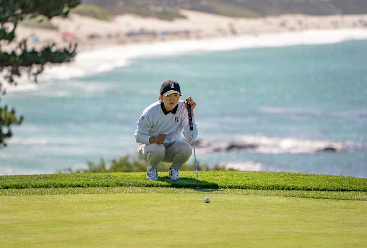Stanford women’s golfer Rose Zhang lines up a putt at No. 8 during the Carmel Cup at Pebble Beach on Saturday, Sept. 3, 2022 in Pebble Beach, Calif. Zhang shot 9-under 63 to set a new women’s record at the course.
