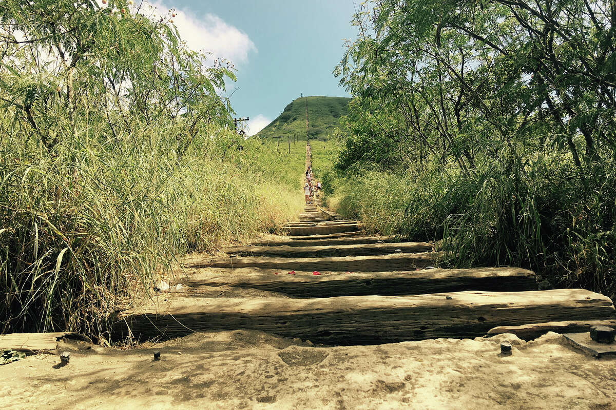 A look at the Koko Crater Stairs — an abandoned military railway from World War II — running straight up the rim of a 1,200-foot-tall volcanic cone on the Hawaiian island of Oahu.