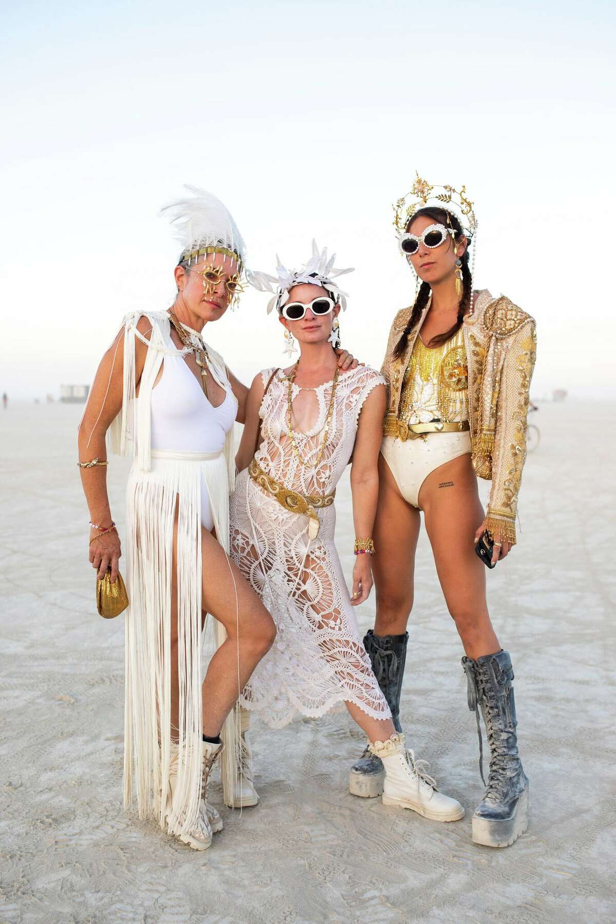 @bethielle, @3casascareyes and @ravenkauffman at Burning Man 2022 at the Black Rock Desert in Gerlac, Nevada.