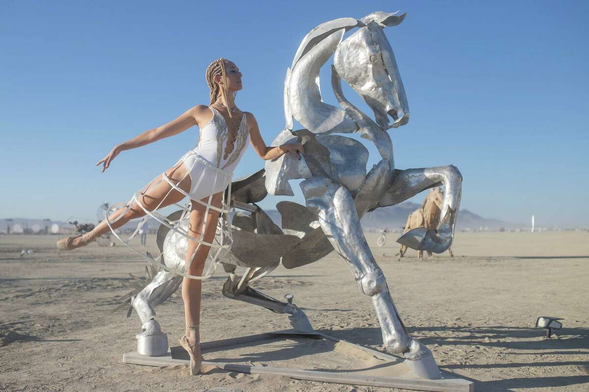 Marlowe Bassett of Metamorphosis Ballet at Wild Horses of the American West by Artist Collective of Reno, Nevada at Burning Man 2022 in the Black Rock Desert of Gerlach, Nevada.