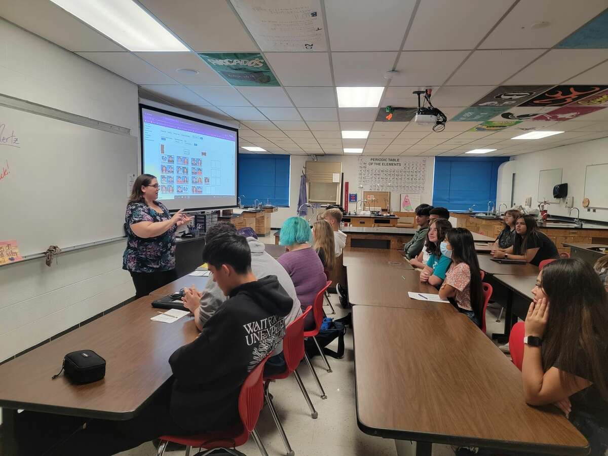 Lynn Mertz, chemistry teacher at Benzie Central High School talks to students about school policies on the first day of the new school year. 