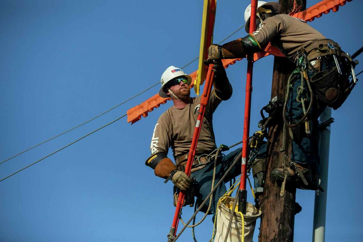 Team members from Bandera Electric Cooperative work together on a challenge during the 2022 Texas Lineman’s Rodeo held at Nolte Island Recreation Area in Seguin, TX, on July 16, 2022. This is the first rodeo event in two years due to the pandemic. Competitors from across Texas showed off trade skills like pole climbing, hurt-man rescues and equipotential grounding with arrestor change-out.