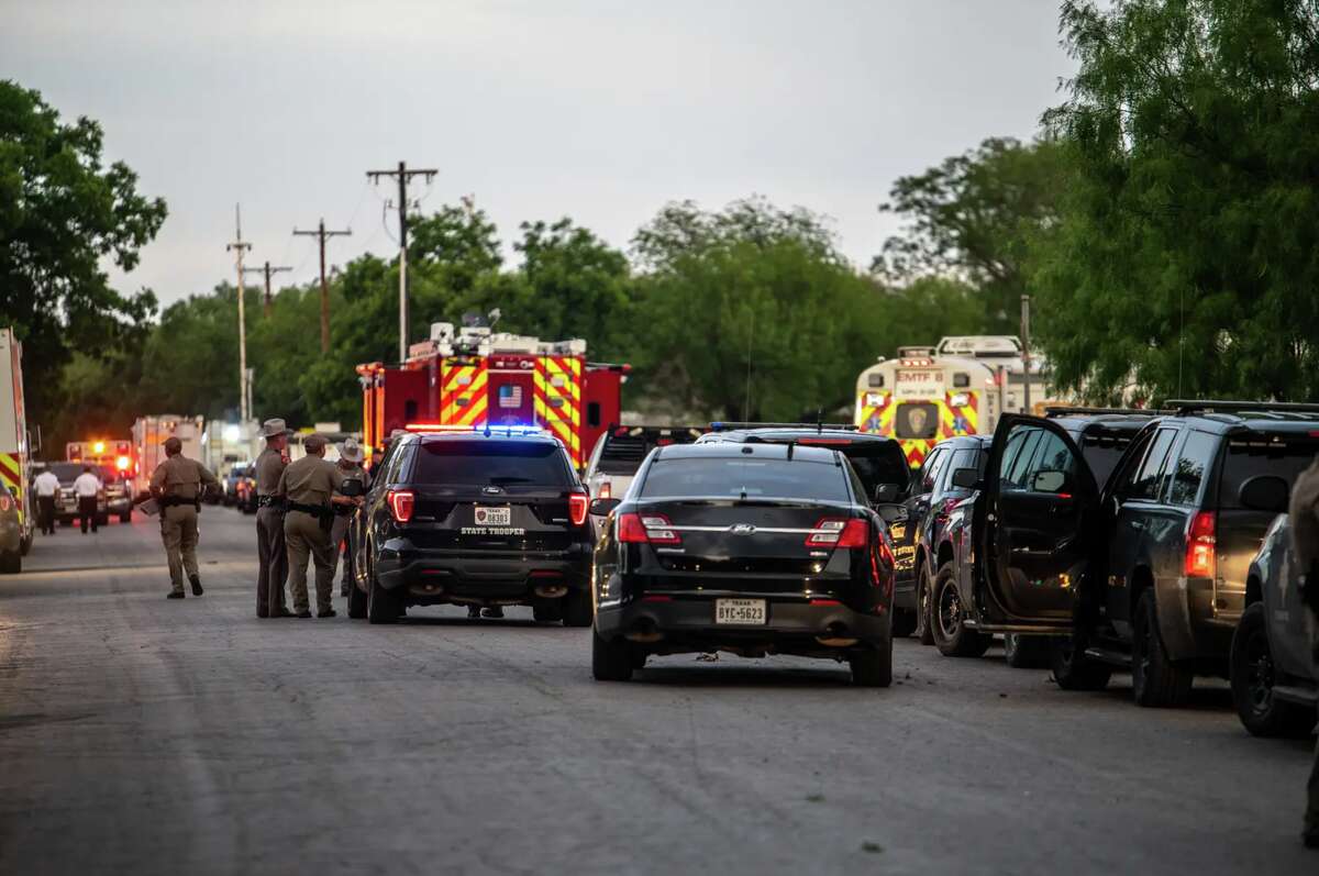 Police block off the road leading to Robb Elementary on May 24, the day a gunman killed 19 students and two teachers in Uvalde. 