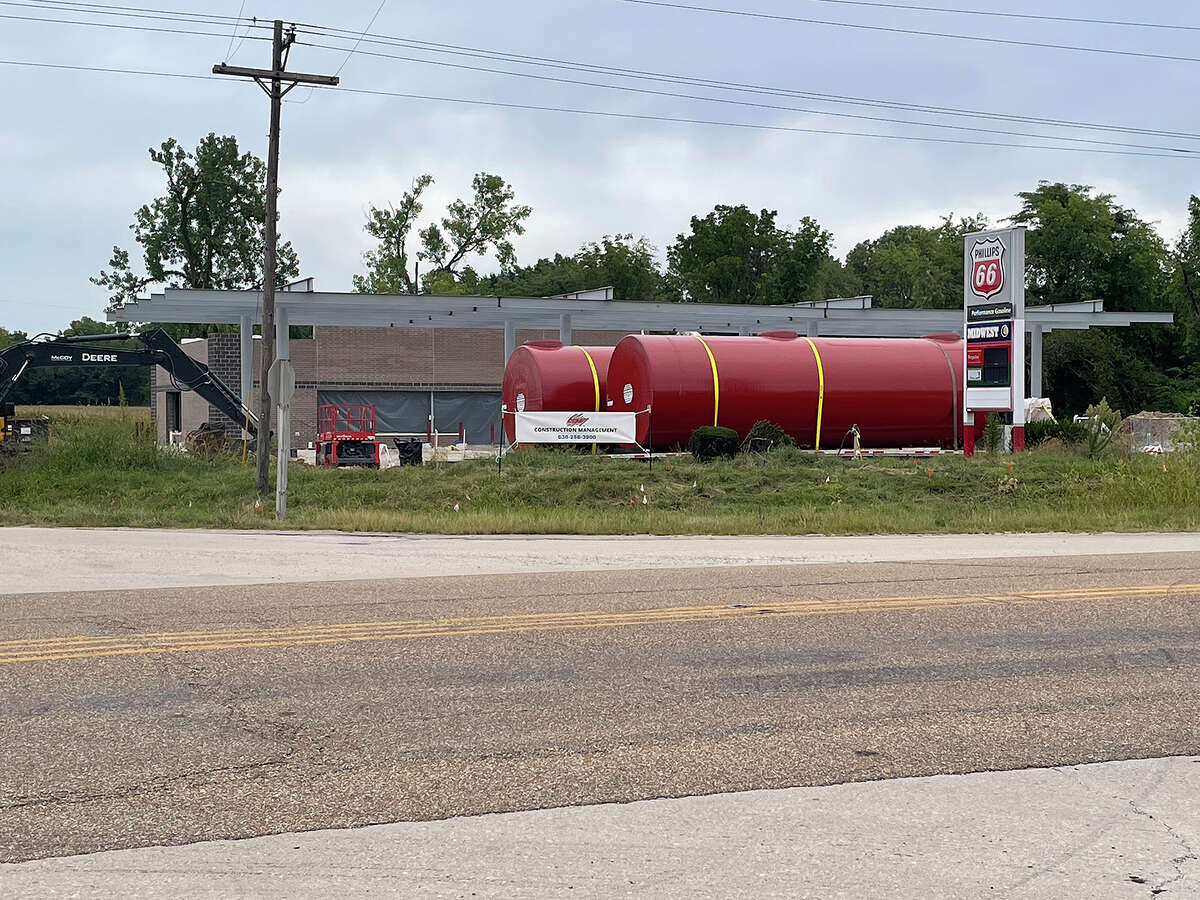 This image, taken on Sept. 2, shows two gas storage tanks ready to be sunk in the ground below the skeleton of the gas canopy that is now visible. Beyond that, the convenience store sports at least a sub-roof and its windows have been framed out as the final product arcs toward completion.