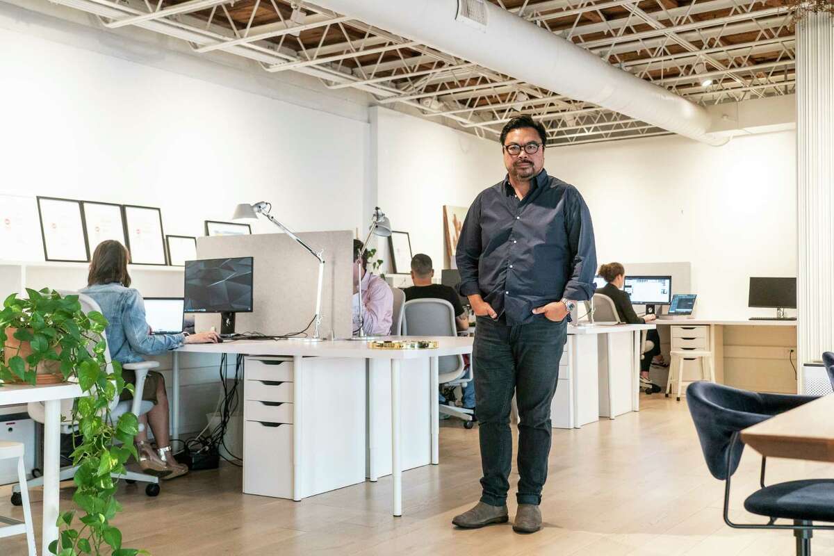 Architect Michael Hsu poses in his Houston office in the Heights.