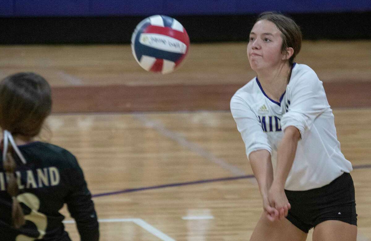 HS VOLLEYBALL Bustos plays with allout effort as Midland High libero