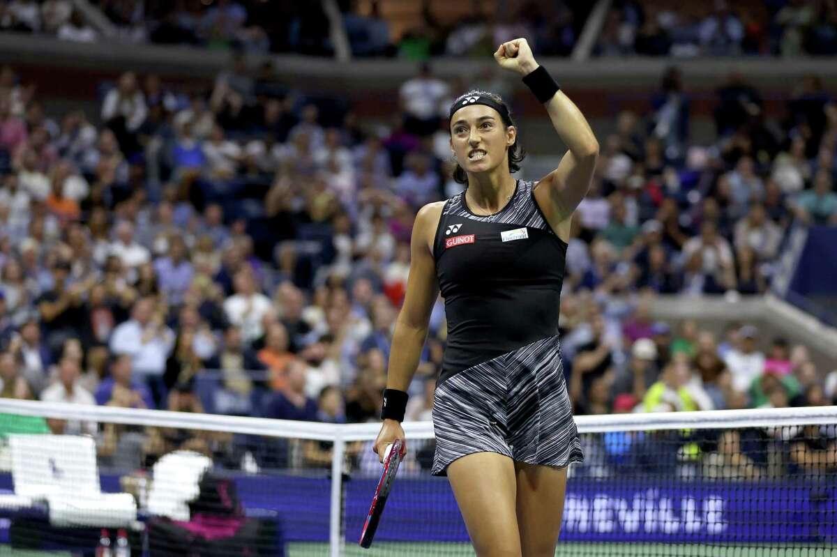 NEW YORK, NEW YORK - SEPTEMBER 06: Caroline Garcia of France celebrates a point against Coco Gauff of the United States during their Women’s Singles Quarterfinal match on Day Nine of the 2022 US Open at USTA Billie Jean King National Tennis Center on September 06, 2022 in the Flushing neighborhood of the Queens borough of New York City. (Photo by Matthew Stockman/Getty Images)