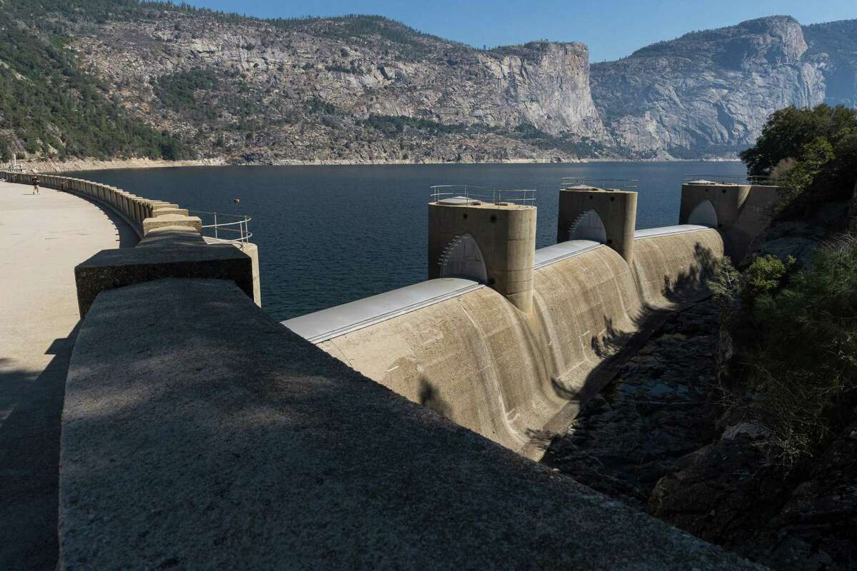 The O’Shaughnessy Dam impounds the Tuolumne River, forming the Hetch Hetchy Reservoir in Yosemite National Park. Under a program being developed by California water regulators, water in the reservoir would be tested for microplastics.