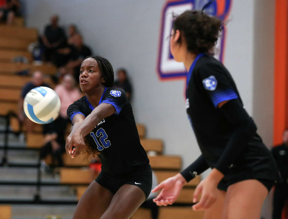 Grand Oaks' Samara Coleman (12) returns a serve in the second set of a District 13-6A high school volleyball match at Grand Oaks High School, Tuesday, Sept. 6, 2022, in Spring.