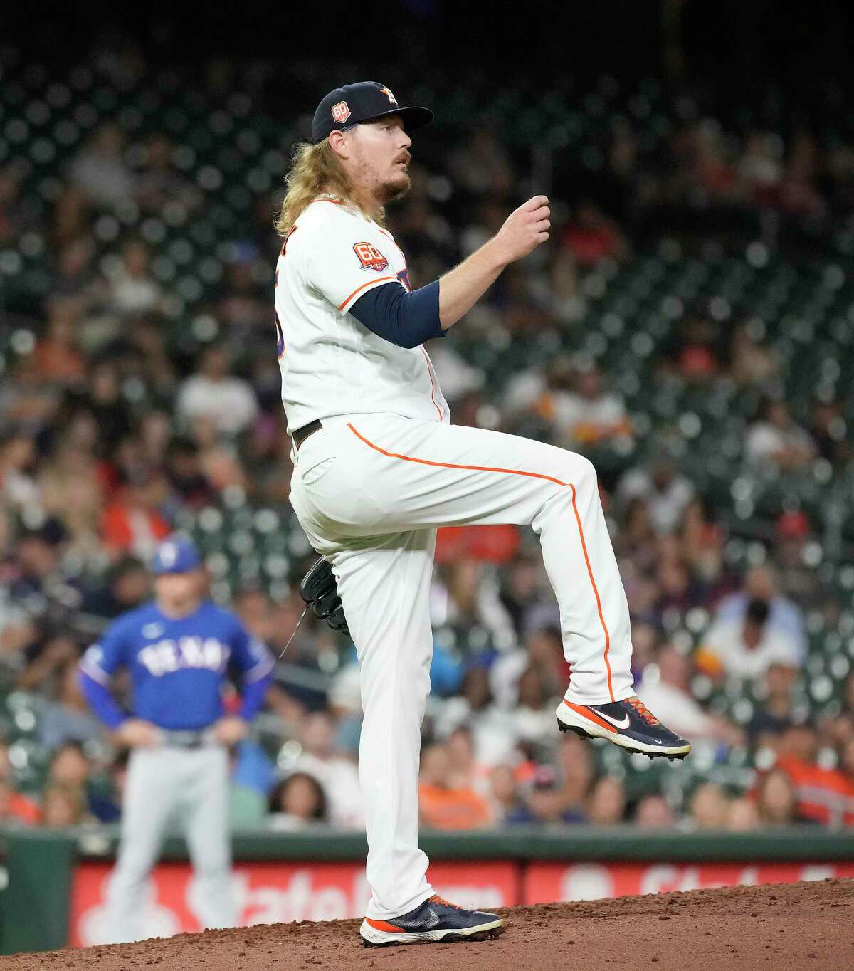 Houston Astros relief pitcher Ryne Stanek (45) reacts after striking out Texas Rangers Bubba Thompson during the eighth inning of an MLB baseball game at Minute Maid Park on Tuesday, Sept. 6, 2022 in Houston.