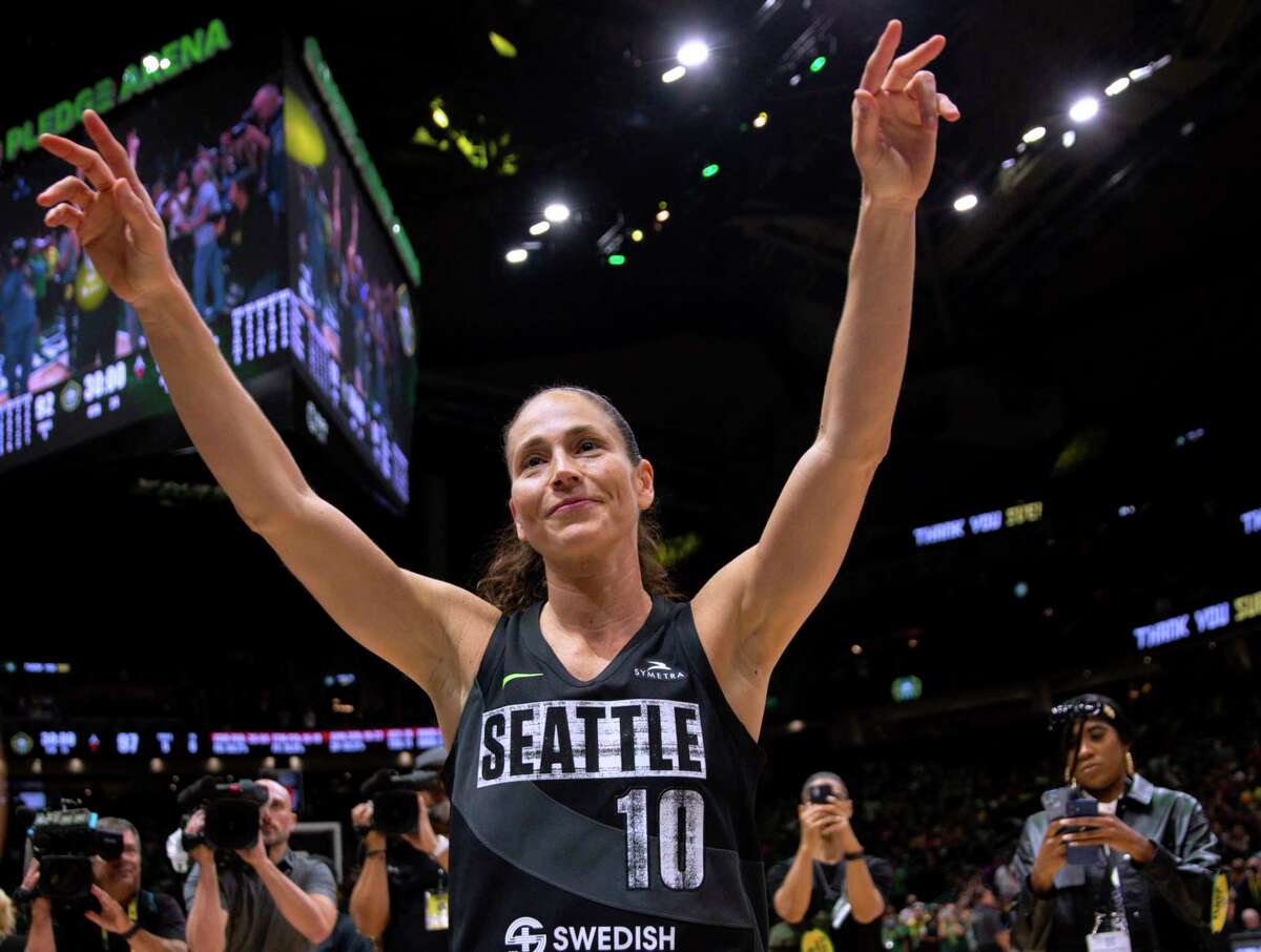 Seattle Storm guard Sue Bird (10) waves to fans chanting her name after the Storm lost to the Las Vegas Aces and were eliminated from the playoffs, in Game 4 of a WNBA basketball semifinal Tuesday, Sept. 6, 2022, in Seattle. The Aces won 97-92.