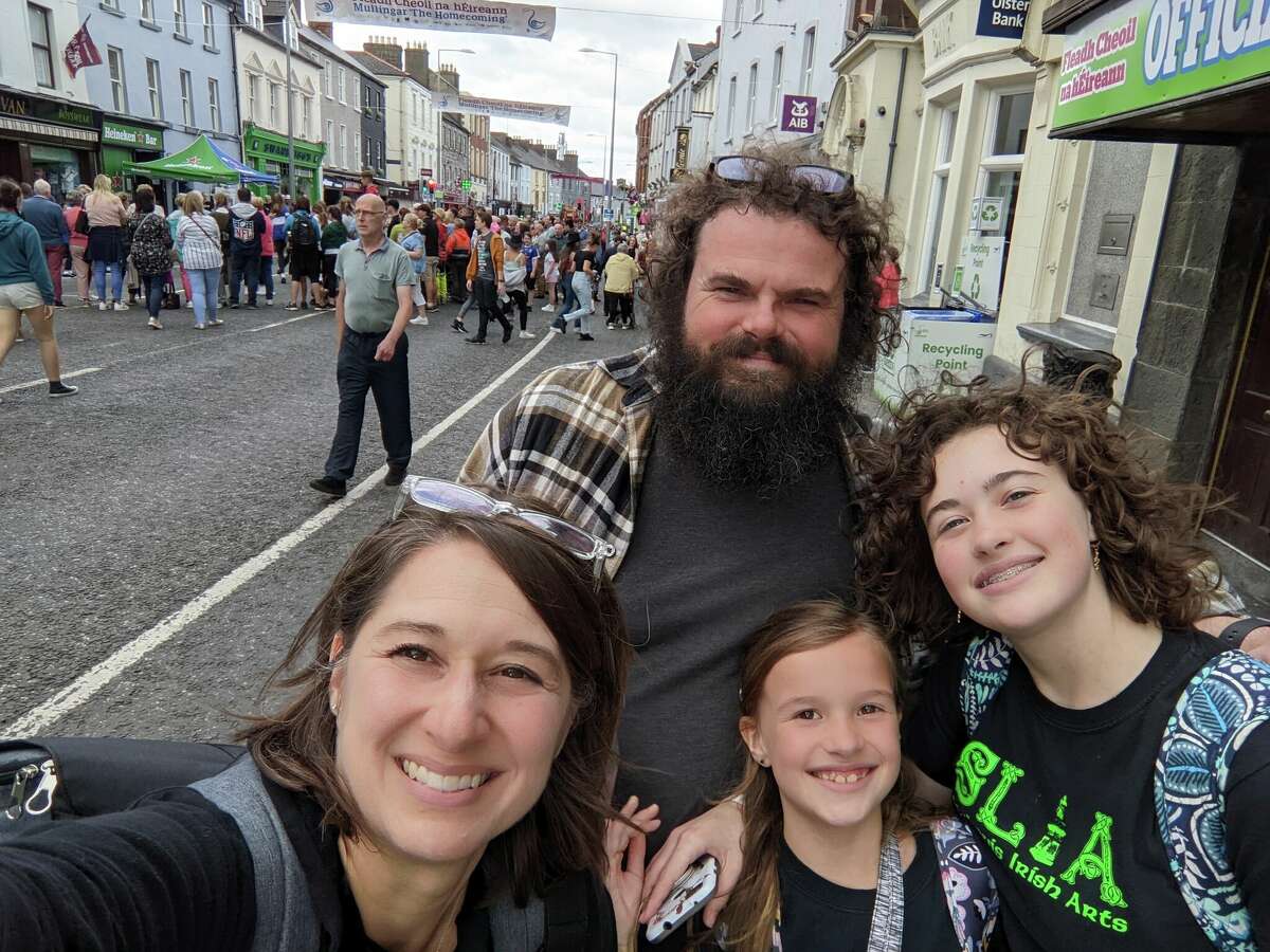 The Harkey family - Jennifer, Jay, Ellie and Gwen - pause on the main street in Mullingar, Ireland during the Fleadh music competition last month.
