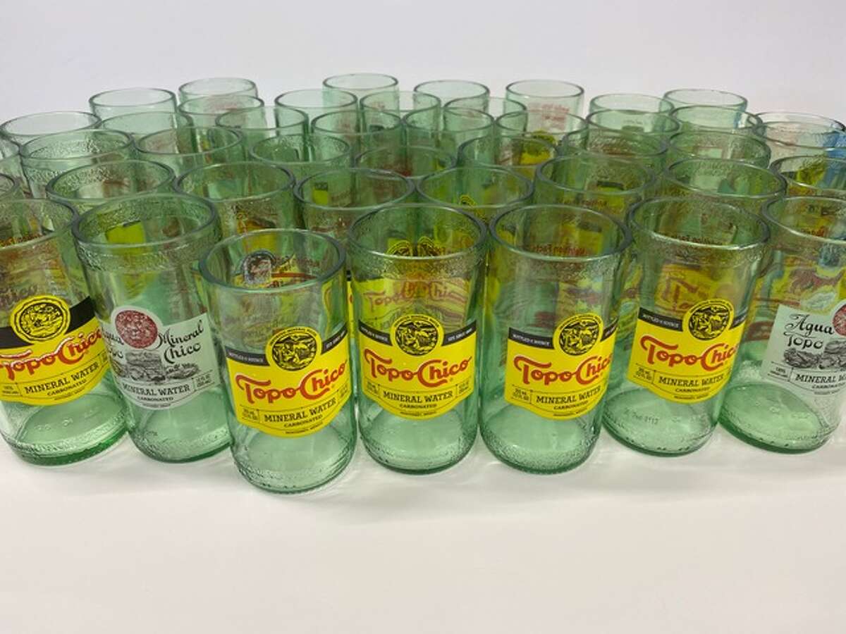 Topo Chico mineral water bottles repurposed into cultural art