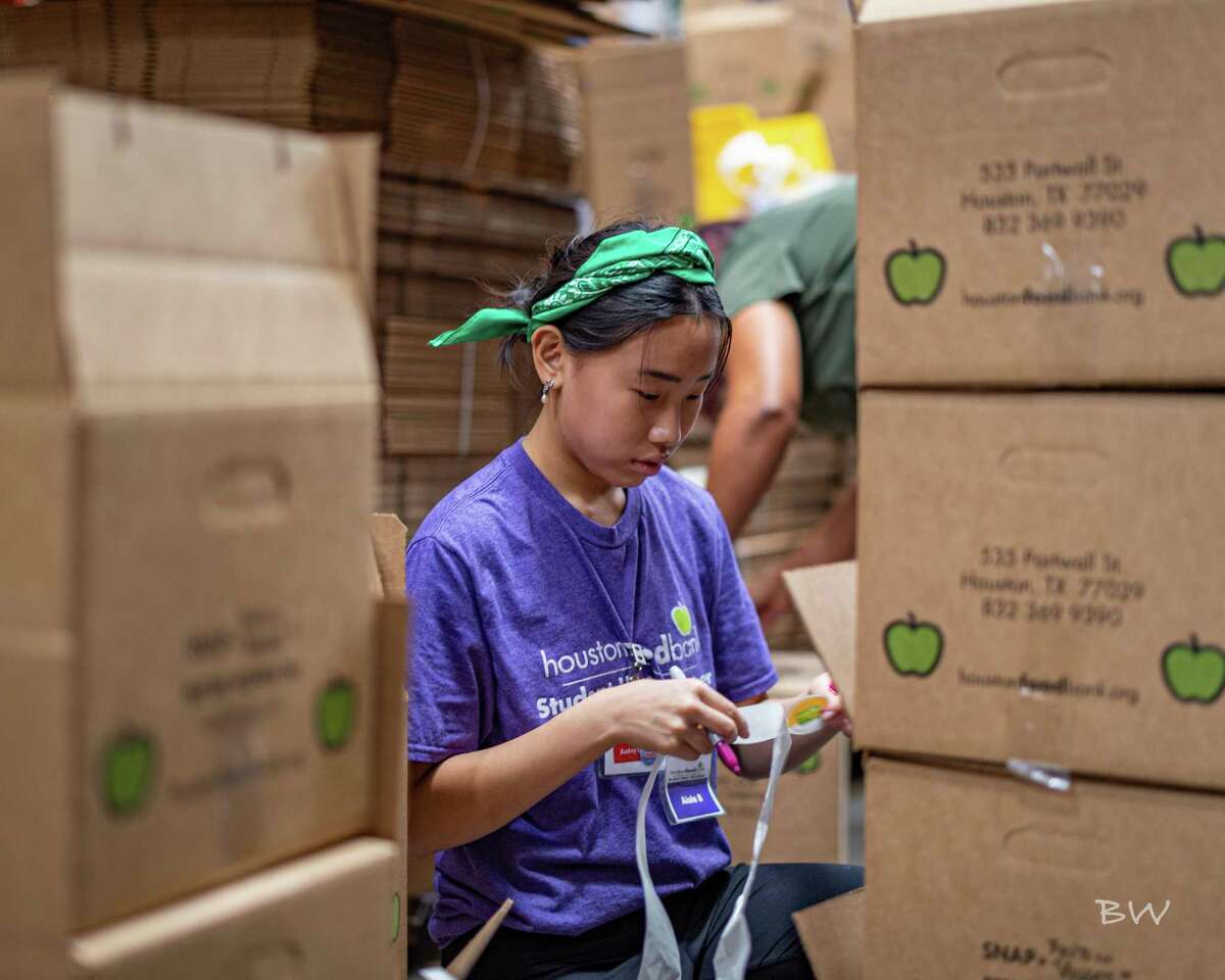 Audrey Chan volunteers at the Houston Food Bank.