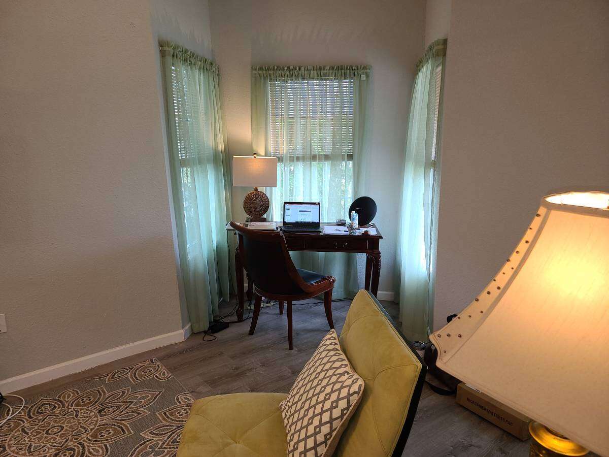 There is an office area in the living room.