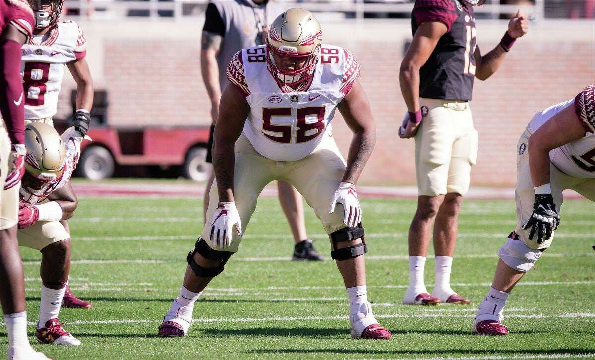 Bless Harris warms up with the Florida State offensive line. 