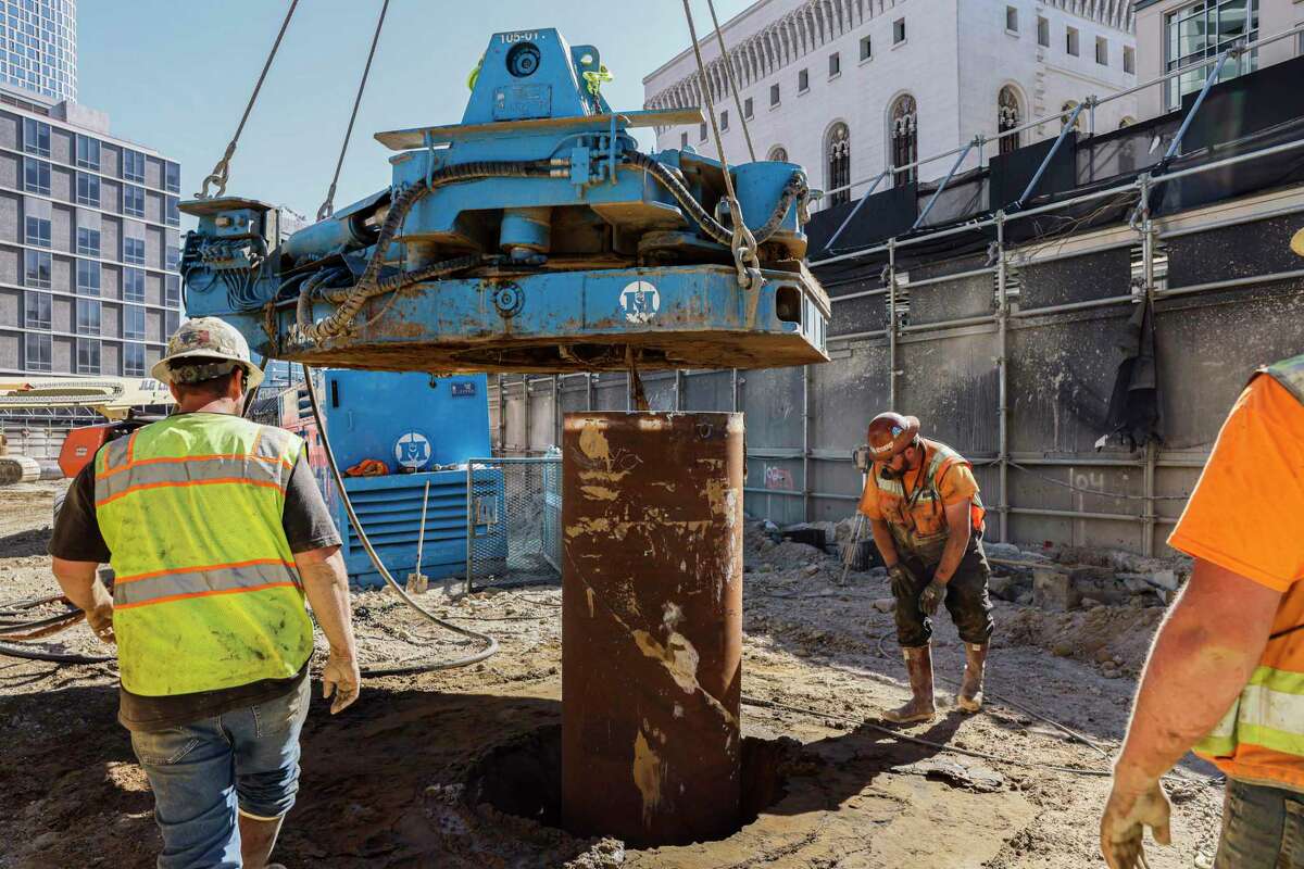 A crew works on construction of 30 Van Ness Ave. in San Francisco, expected to be completed in 2025. Lendlease of Australia is building a 47-story mixed-use tower at the site of a former city office building.