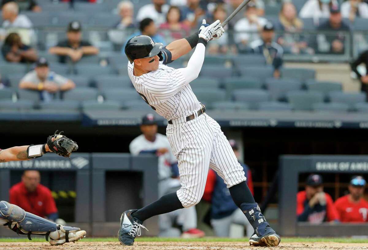 NEW YORK, NEW YORK - SEPTEMBER 07: Aaron Judge #99 of the New York Yankees follows through on his fourth inning home run against the Minnesota Twins during game one of a doubleheader at Yankee Stadium on September 07, 2022 in the Bronx borough of New York City. (Photo by Jim McIsaac/Getty Images)