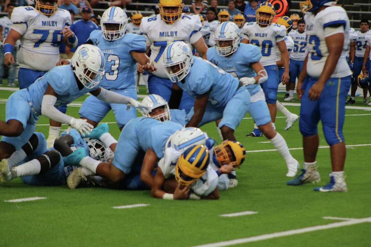 Sam Rayburn's defense stops a Milby run attempt last week. The Texans will get a better picture of how improved their defense is when the team hosts Santa Fe Thursday night. Kick off is 7.