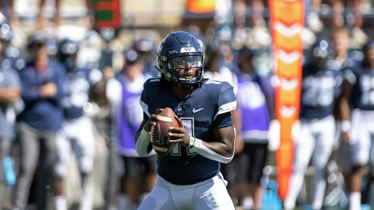UConn football quarterback freshman Zion Turner heads home