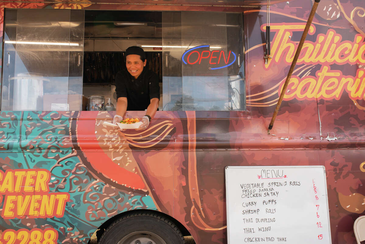 Many local area food trucks serve food at the festival. Thailicious Catering is one of them.