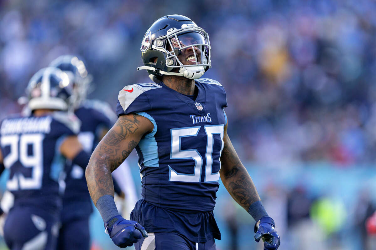 NASHVILLE, TENNESSEE - DECEMBER 12: Derick Roberson #50 of the Tennessee Titans celebrates on the field during a game against the Jacksonville Jaguars at Nissan Stadium on December 12, 2021 in Nashville, Tennessee. The Titans defeated the Jaguars 20-0. (Photo by Wesley Hitt/Getty Images)