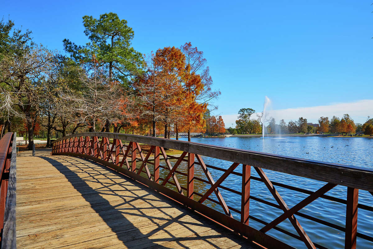 Houston Hermann Park Conservancy and McGovern Lake in autumn.