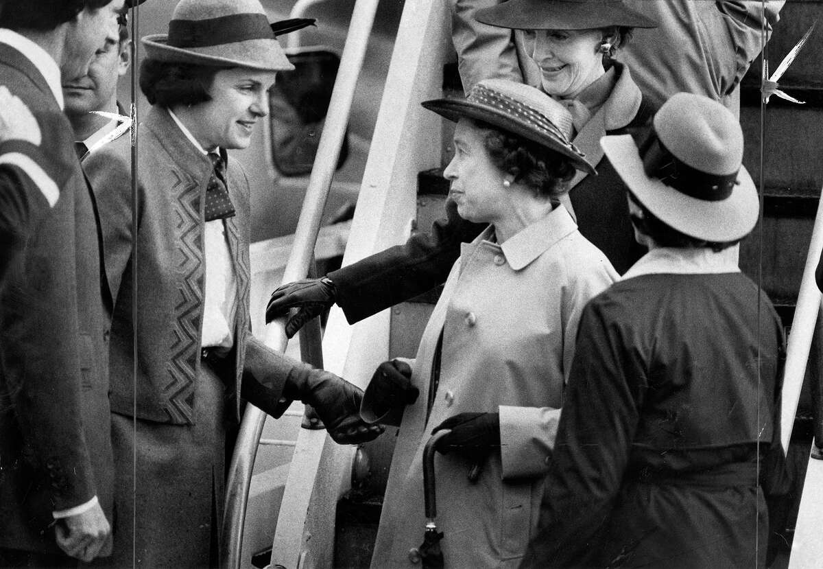 San Francisco Mayor Dianne Feinstein and first lady Nancy Reagan greet Queen Elizabeth II as she arrives at San Francisco International Airport on March 2, 1983. 