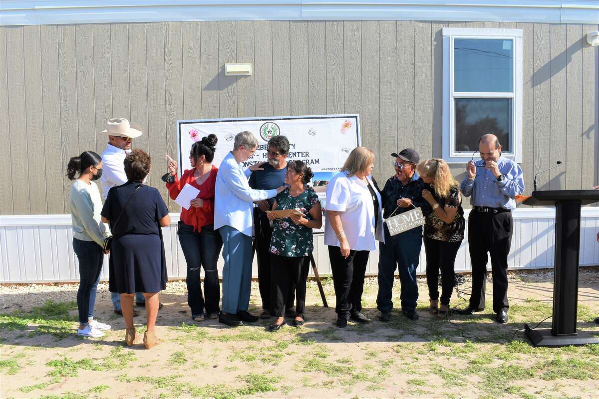 Three families receive new mobile homes through b Co. program