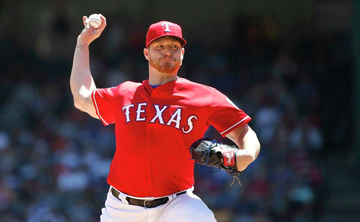 ARLINGTON, TX - APRIL 21: Shelby Miller #19 of the Texas Rangers throws against the Houston Astros during the first inning at Globe Life Park in Arlington on April 21, 2019 in Arlington, Texas. (Photo by Ron Jenkins/Getty Images)