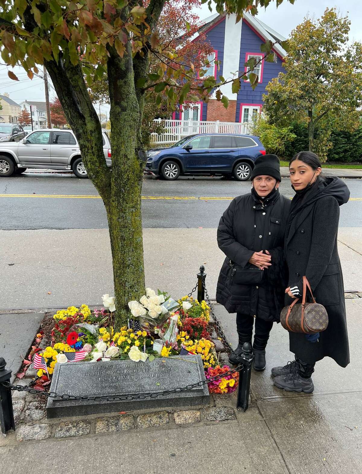 Lorena Made and her mother, Luz Marina Made, stand by a memorial that honors the people who were killed in the crash of American Airlines Flight 587 in 2001 in Queens, N.Y. Maricio Jose Made, Lorena’s father and Luz Marina’s husband, perished in the crash. San Antonio attorney Christopher Pettit obtained a legal settlement for the Mades, but Lorena Made said they never received all of the money they were due.