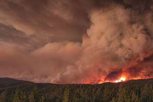 Tahoe National Forest fire rages, swirls in astonishing footage