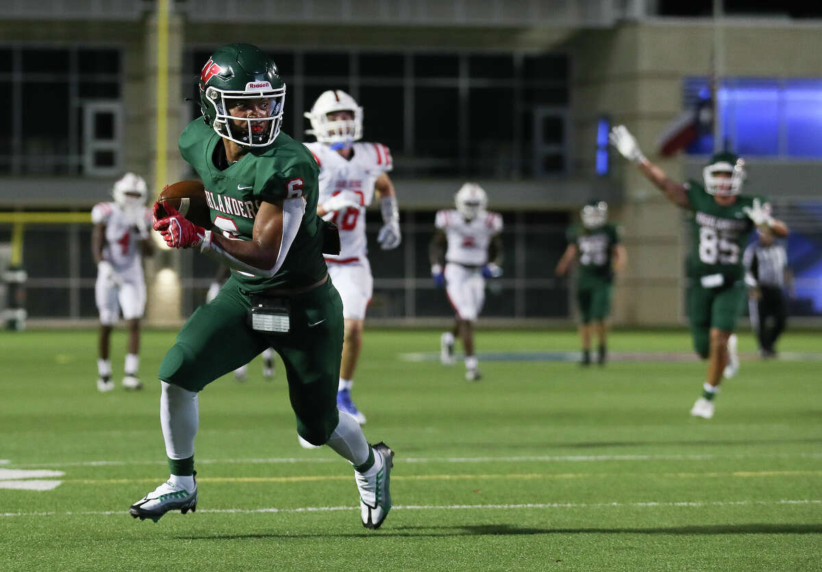 The Woodlands wide receiver Jason Williams (6) turns up field after catching a pass from wide receiver Patrick Rabel for a 35-yard touchdown in the third quarter of a District 13-6A high school football game at Woodforest Bank Stadium, Thursday, Sept. 8, 2022, in Shenandoah.