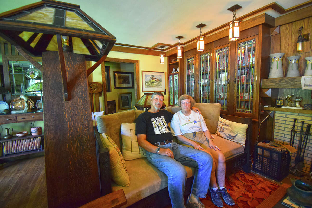 Bob and Cathy Randall relax in their Jacksonville home, which they transformed to the Arts and Crafts style championed by architect Frank Lloyd Wright.