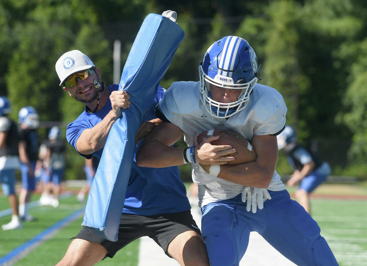 Conn. high school Thanksgiving football is back after COVID break