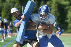 Darien's football legacy drives Wave in title defense