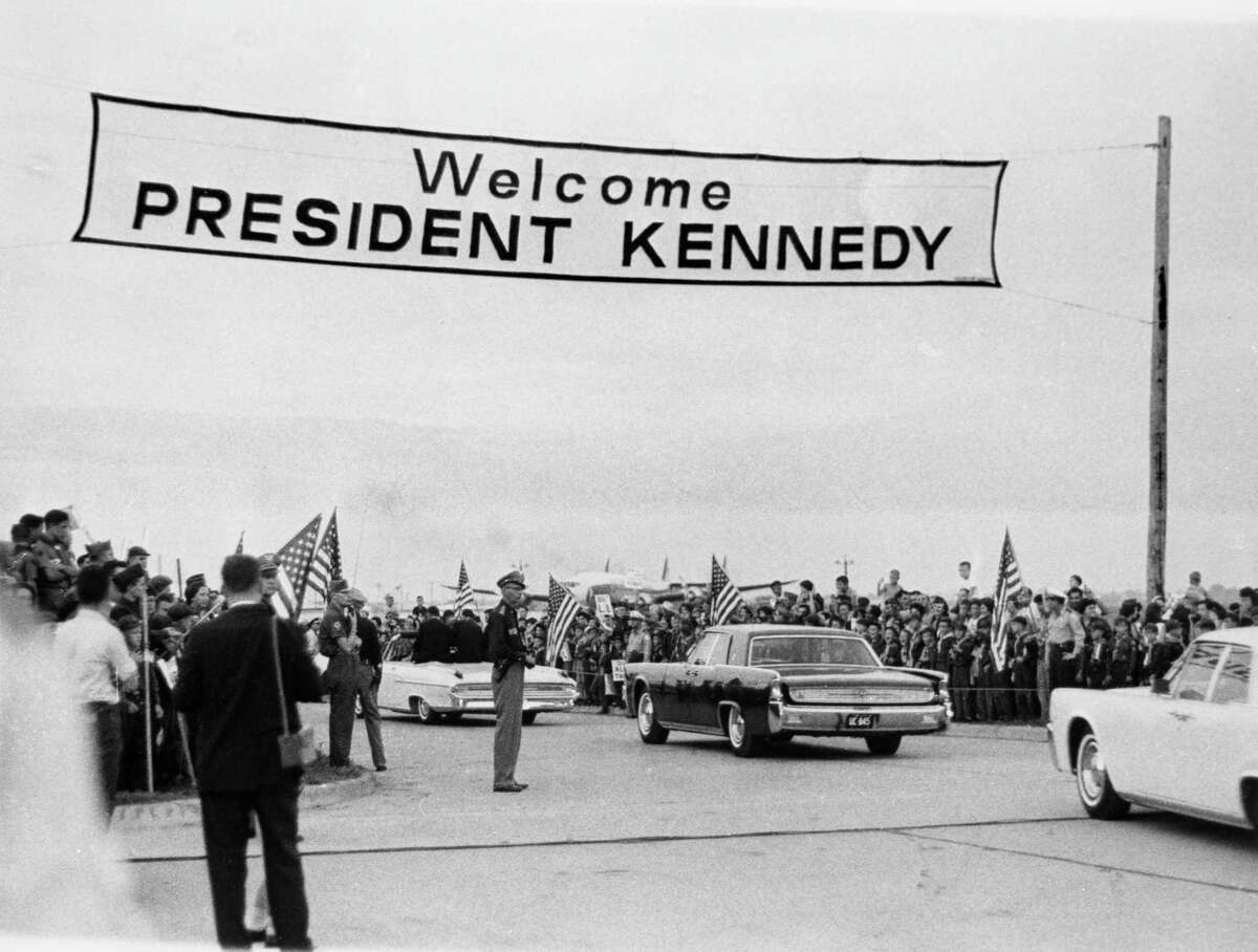 President John F Kennedy and his motorcade are greeted with "Welcome President Kennedy" Sept. 1962. 