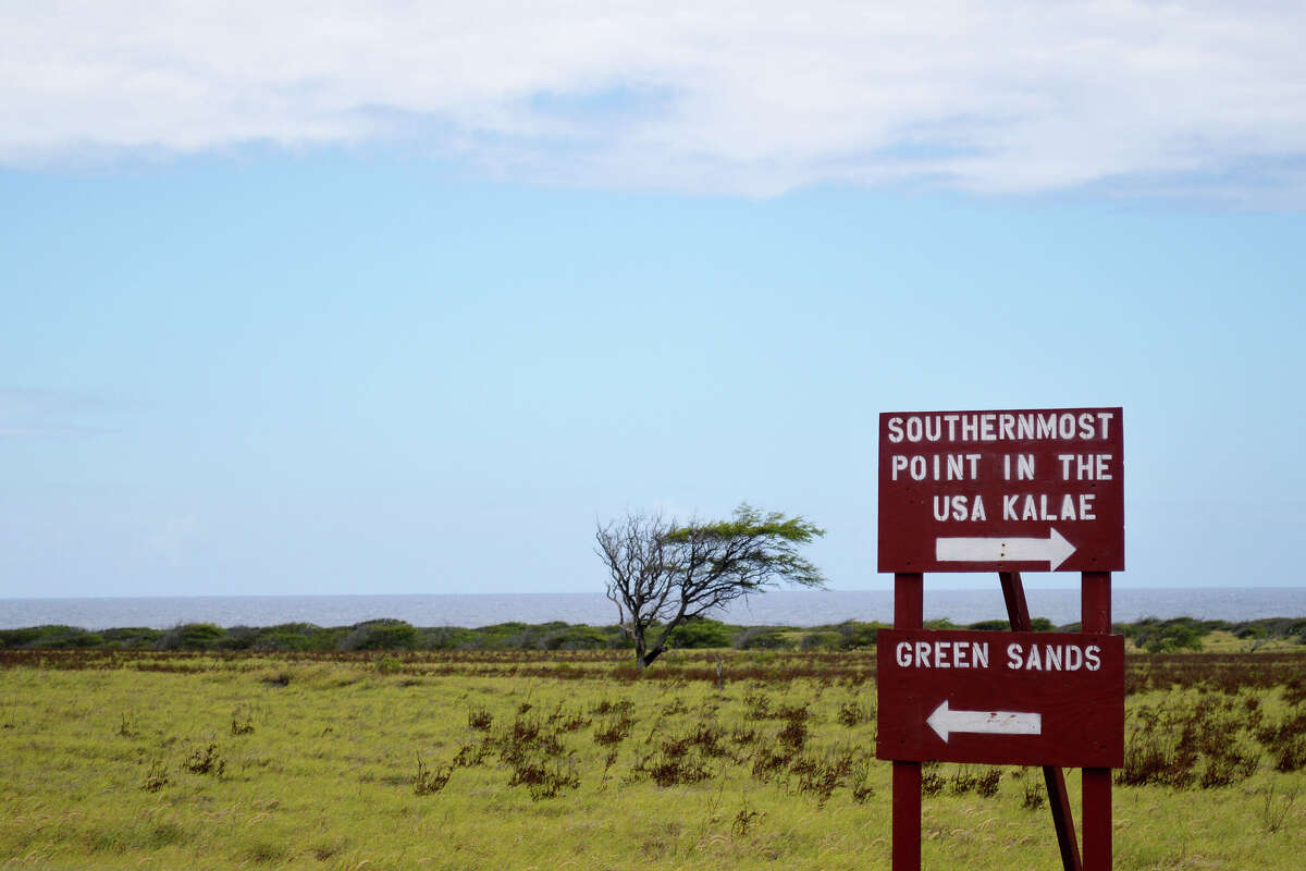 A sign on the Big Island of Hawaii indicating the way to Papakolea Beach (aka Green Sands Beach) and to Ka Lae (Hawaiian for "The Point"), the southernmost point of the U.S.