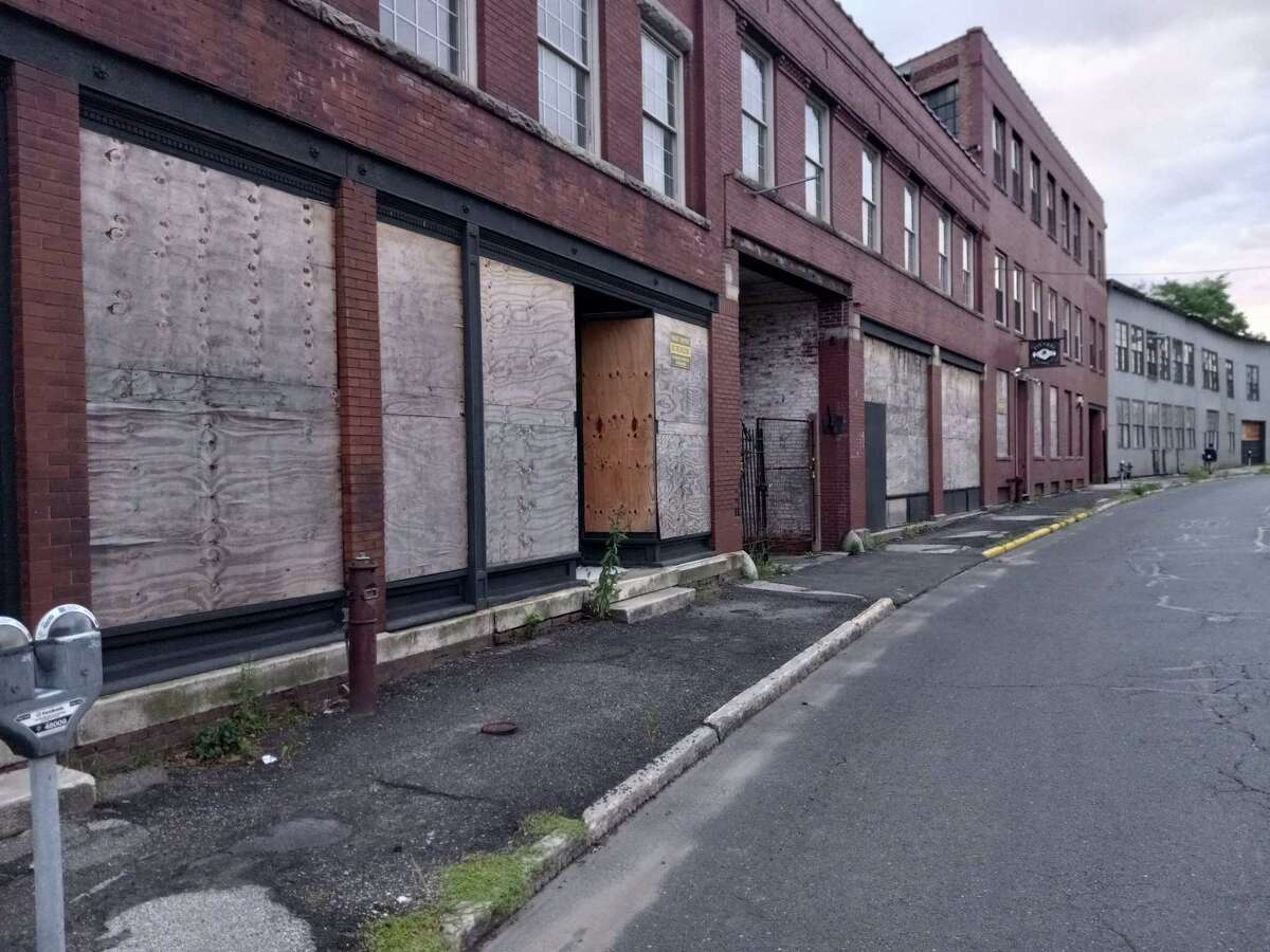 Torrington is applying for a state brownfield grant for $1.5 million. If received, the money will be used to demolish some of the more dilapidated portions of the Hotchkiss property on Water Street and remove hazardous material from it, as well as the adjacent site on Church Street. A proposal to use the properties for a housing development with retail space was presented to the city last year.