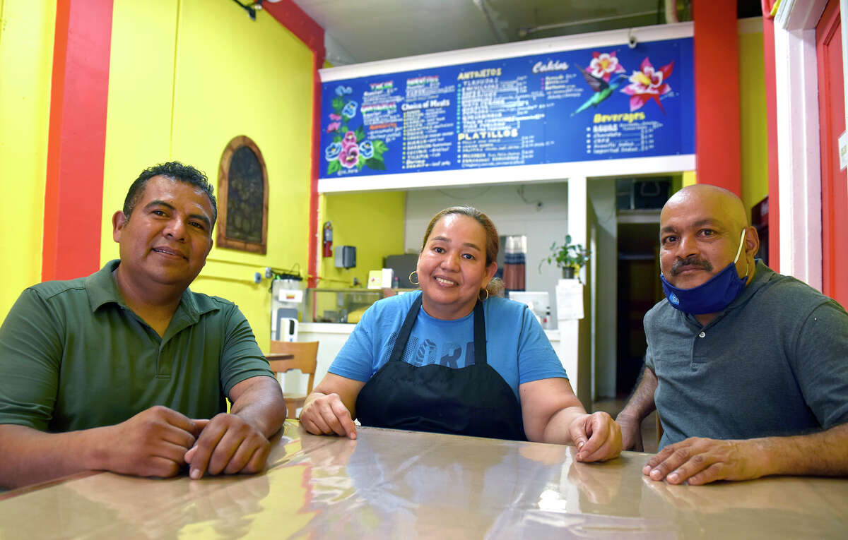 La Oaxaqueña staff members, from left: owner Alfredo Ramos, chain cook Roxana Chicas and chef Harry Persaud, pictured inside their restaurant on Wednesday, September 7, 2022.