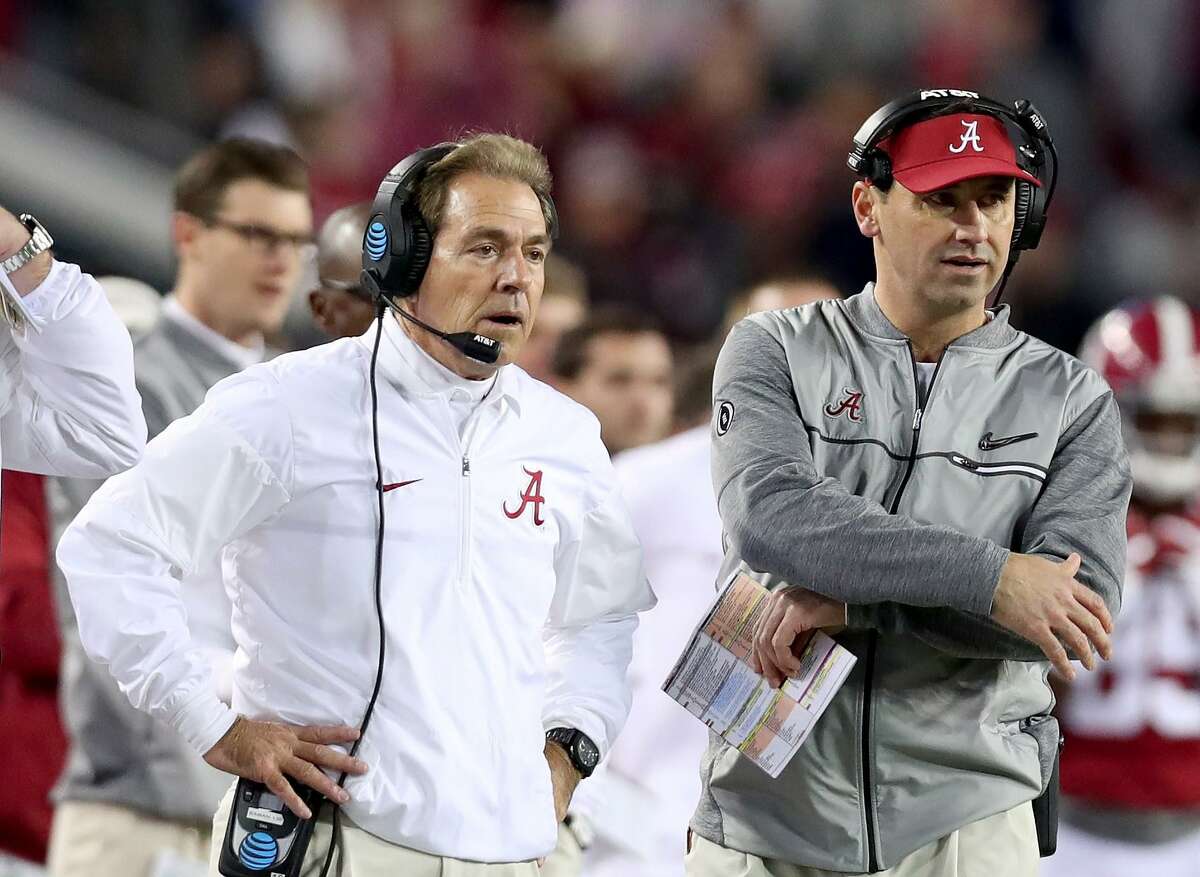 Nick Saban’s last national title came with Steve Sarkisian, right, as his offensive coordinator.