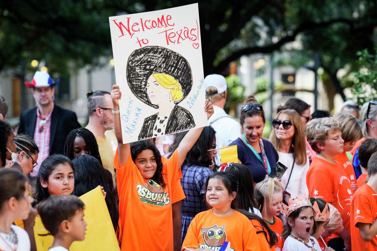 Students from Osborne Elementary and other schools wait to welcome Queen Maxima of the Netherlands to City Hall on Friday, Sept. 9, 2022 in Houston. (Brett Coomer/Houston Chronicle via AP)