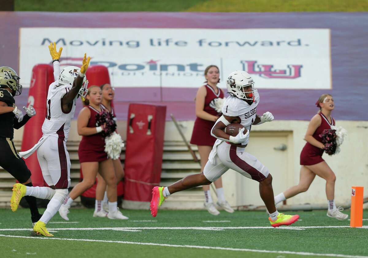 Silsbee's Drelon Miller scores a touchdown Friday night during a game against Nederland at Lamar University's Provost Umphrey Stadium. The Tigers led 17-0 at halftime.