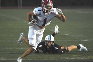 New Canaan football blanks Xavier behind Telesco's four TDs