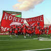 HOUSTON, TX SEP 9: North Shore players enter the field during the non-district high school football game between the Westfield Mustangs and North Shore Mustangs at Galena Park ISD Stadium in Houston, Texas.