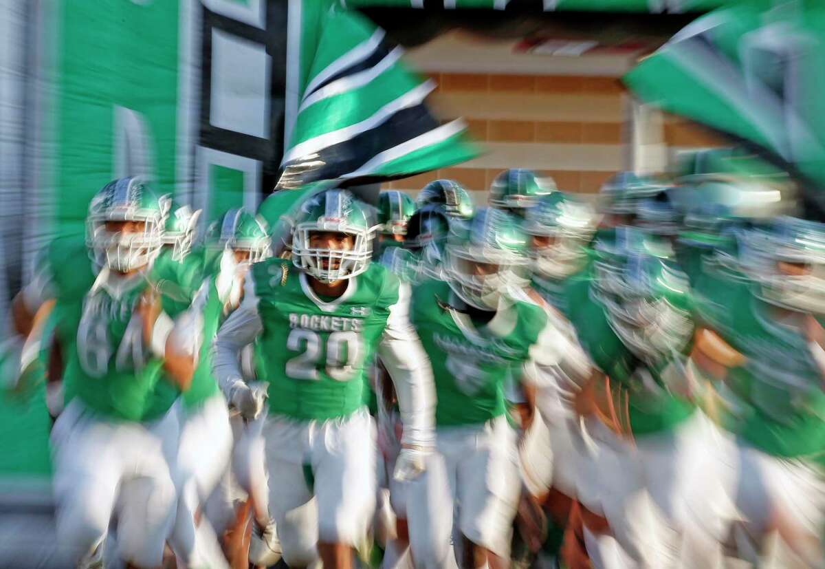 Kennedy football team runs onto the field before the start of their game against Bandera at Edgewood Memorial Stadium, on Friday, Sept. 9, 2022.