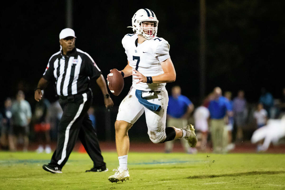 Second Baptist quarterback Turner Murdock (7) rolls out to attempt a pass in a nondistrict high school football game between Second Baptist and Episcopal Friday, Sep 9, 2022, in Bellaire.